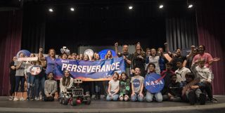 Students chant, "Go Perseverance!" during an event to announce the official name of the Mars 2020 rover, on March 5, 2020, at Lake Braddock Secondary School in Burke, Virginia.