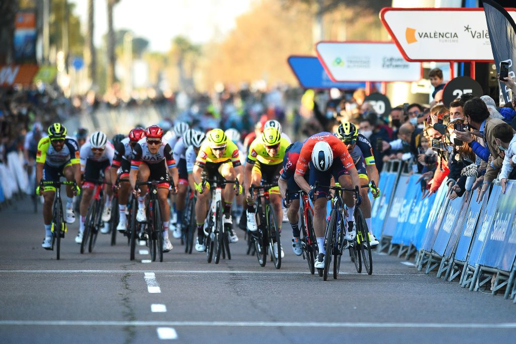 VALENCIA SPAIN FEBRUARY 06 LR Elia Viviani of Italy and Team INEOS Grenadiers and Fabio Jakobsen of Netherlands and Team QuickStep Alpha Vinyl orange points jersey sprint to win during the 73rd Volta A La Comunitat Valenciana 2022 Stage 5 a 92km stage from Paterna to Valencia VCV2022 on February 06 2022 in Valencia Spain Photo by Dario BelingheriGetty Images