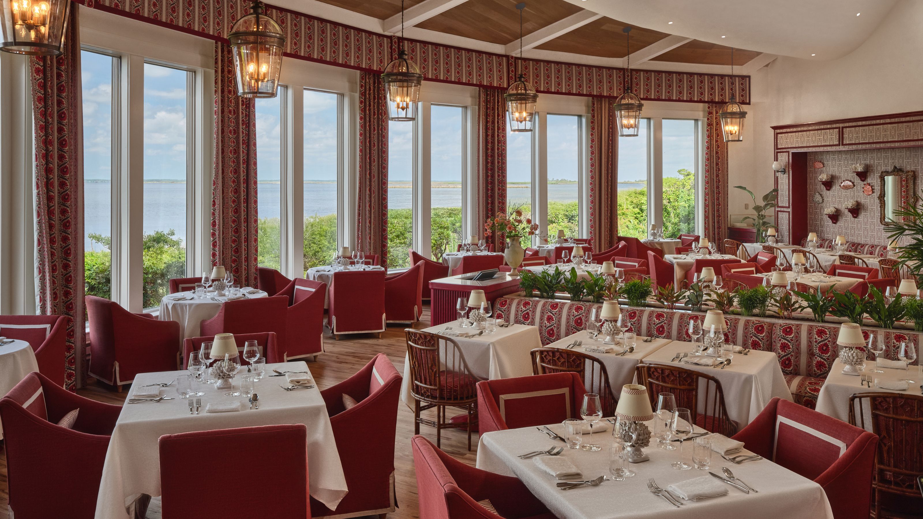 The restaurant at the Sanderling hotel decorated with a red and white color scheme