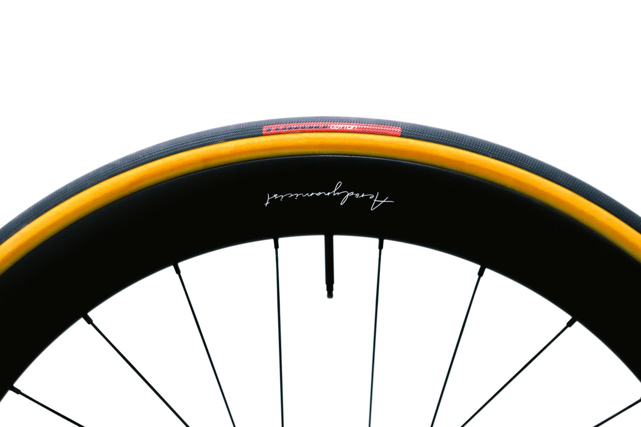 A tan bicycle tyre on a white background
