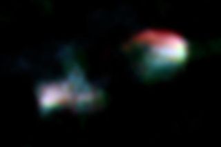 This radio band composite image of Arp 187, obtained by the VLA and ALMA telescopes (blue: VLA 4.86 GHz, green: VLA 8.44 GHz, red: ALMA 133 GHz), shows clear bimodal jet lobes. But the central nucleus (center of the image) is dark.