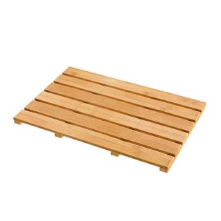 A light brown bamboo bath mat 