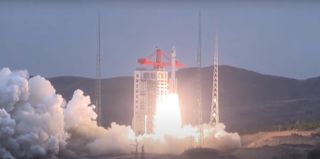 A Chinese Long March 6 rocket with four solid strap-on boosters launches two satellites to space on March 29, 2022.