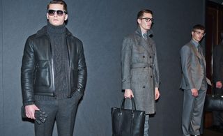 Gieves & Hawkes A/W 2014 - young men standing against grey wall