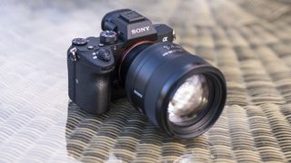The Sony A7 III full-frame camera sitting on a glass table