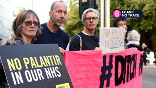 People holding placards against Palantir during a Bristol protest in October 1, 2026