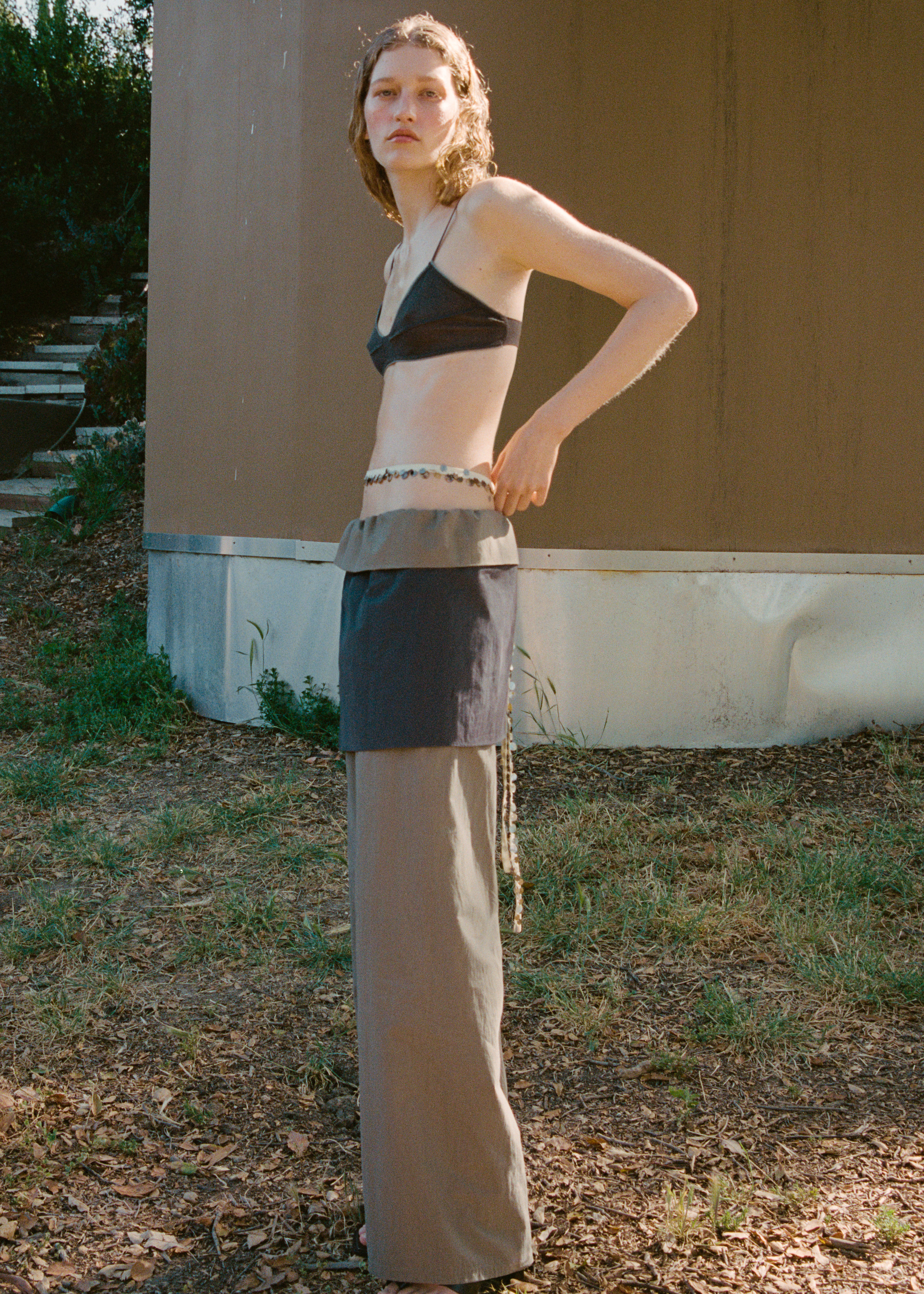 A model poses for summer's Mango x Eckhaus Latta collaboration