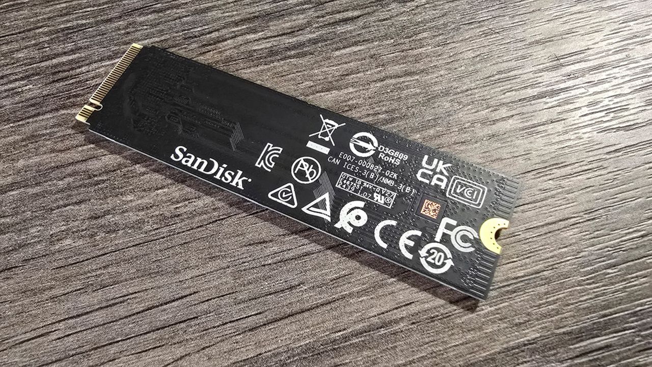 A WD Black SN7100 SSD installed inside a gaming PC.