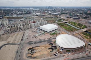 London 2012 Aquatics Centre by Zaha Hadid: View of the Velodrome looking south, showing the other venues of the Olympic Village