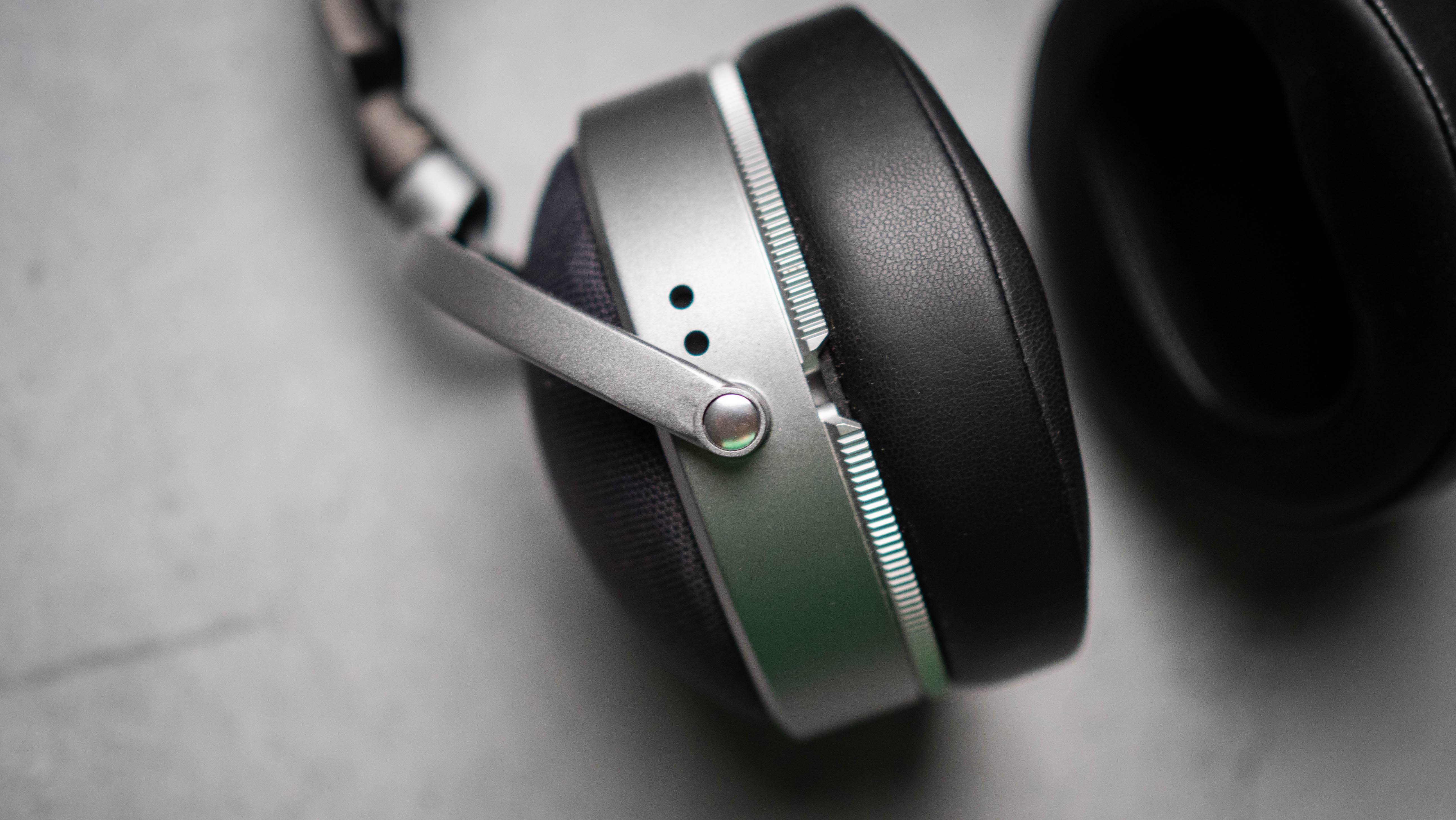 Audeze LCD-S20 planar headset in front of gray kraft sheet highlighting product design