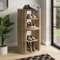 Ria rotating shoe storage by front door.