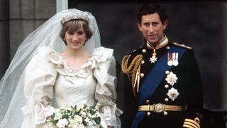 london, united kingdom july 29 prince charles and princess diana on the balcony of buckingham palace on their wedding day the princess is wearing a wedding dress designed by david and elizabeth emanuel the prince is wearing naval dress uniform photo by tim graham photo library via getty images