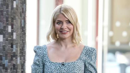 Holly Willoughby's cute cream jumper, Holly Willoughby seen filming "This Morning" on March 30, 2021 in London, England.