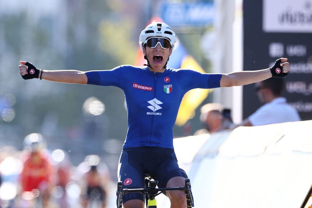Italys Elisa Balsamo celebrates as she crosses the finish line to win the womens elite cycling road race 1577km from Antwerp to Leuven on the seventh day of the Flanders 2021 UCI Road World Championships on September 25 2021 in Leuven Photo by KENZO TRIBOUILLARD AFP Photo by KENZO TRIBOUILLARDAFP via Getty Images