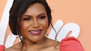 Mindy Kaling wearing one of the key fall makeup looks, including matching pink eyeshadow and lips