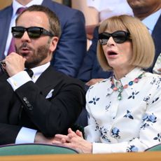 Anna Wintour wore a drop-waist dress at Wimbledon in July 2025 with Tom Ford