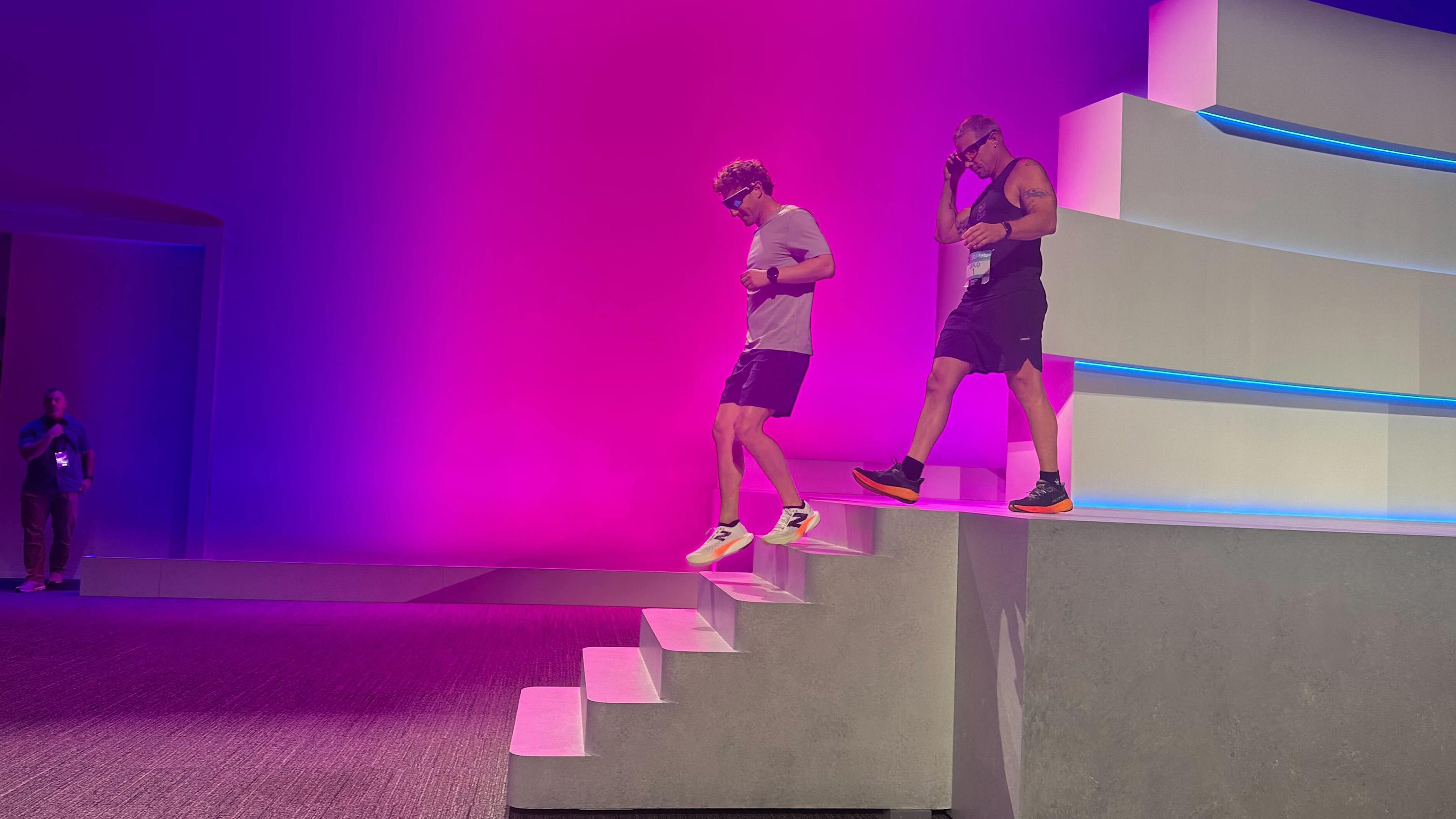Mark Zuckerberg and Diplo running off stage wearing Oakley Meta Vanguard smart glasses