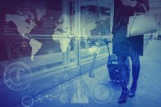 Woman walking through an airport on the way to a new career