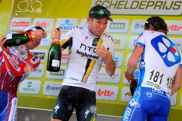 Cavendish gets an eye full of champagne on the Scheldeprijs podium