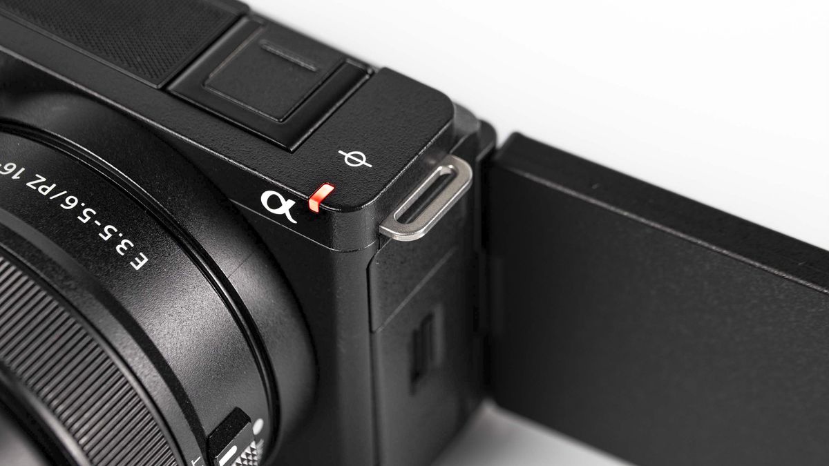 Sony ZV-E10 II on reflective surface and white background