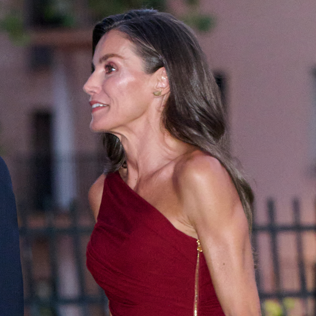 Queen Letizia wearing a one shouldered red dress