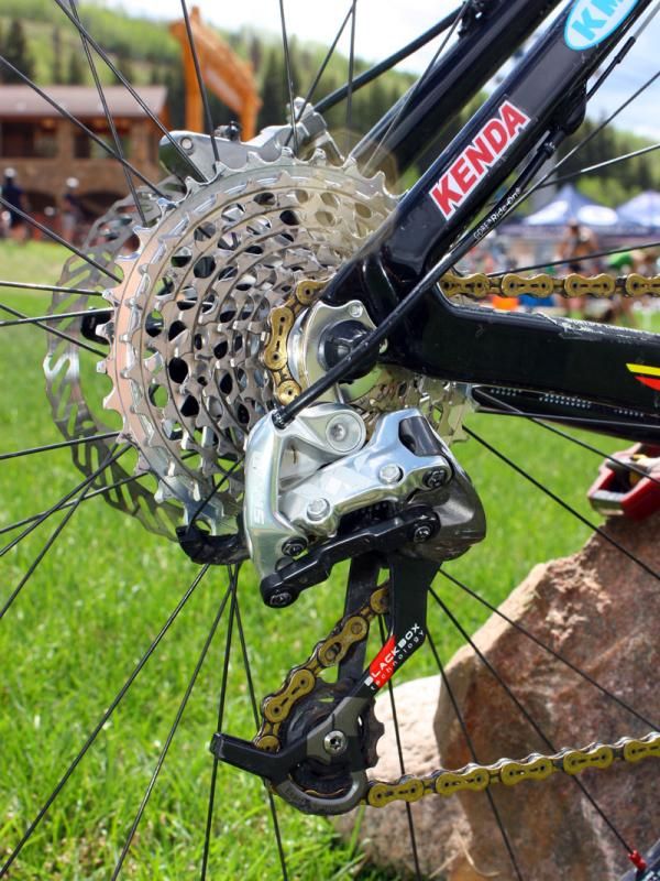 A SRAM XX rear derailleur moves the chain across the heavily machined XX cassette.