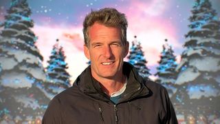 Dan Snow in front of a snowy background for Strictly Come Dancing Christmas Special.