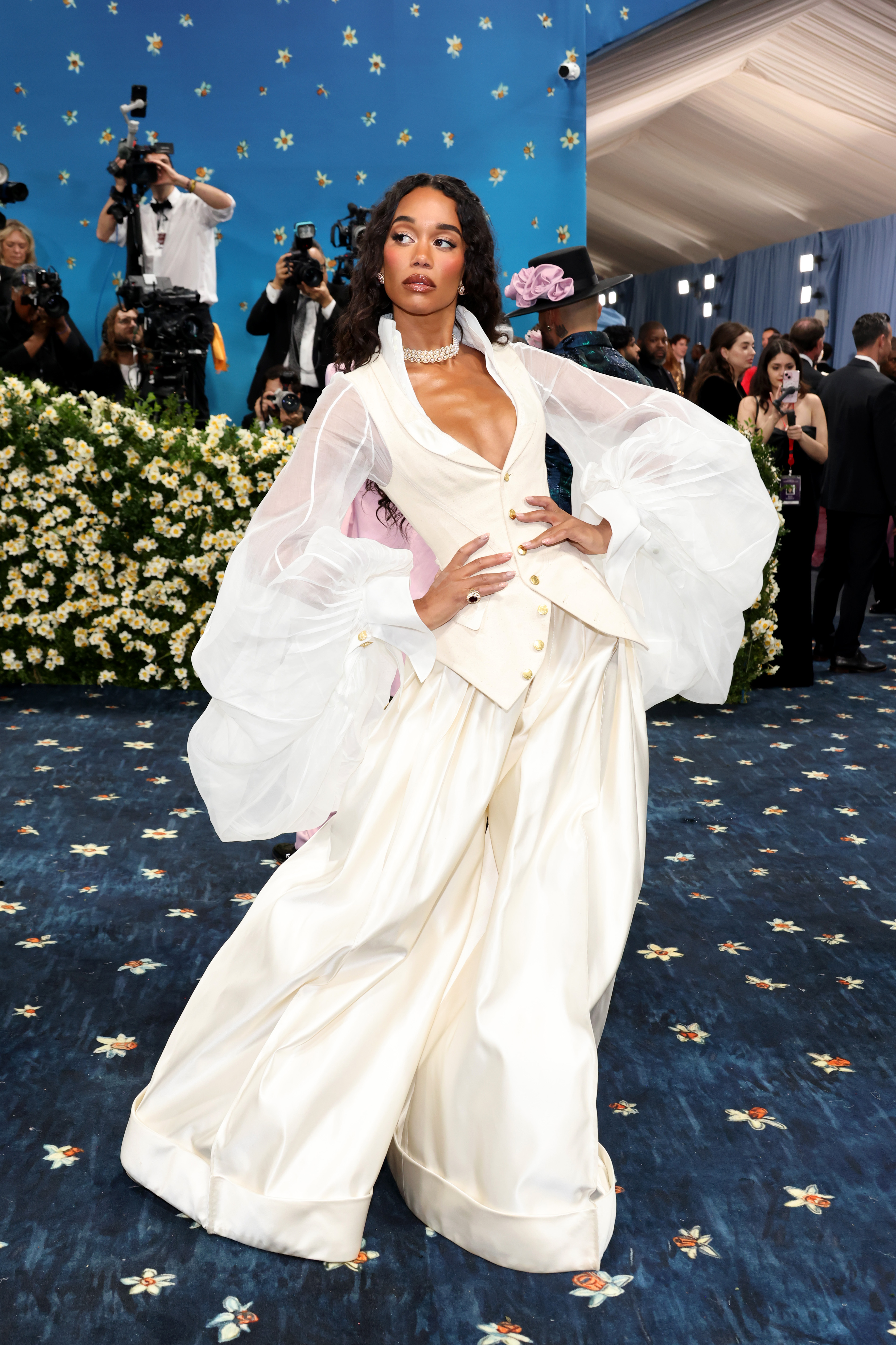 An image of Laura Harrier wearing a waisted blazer to the 2025 Met Gala.