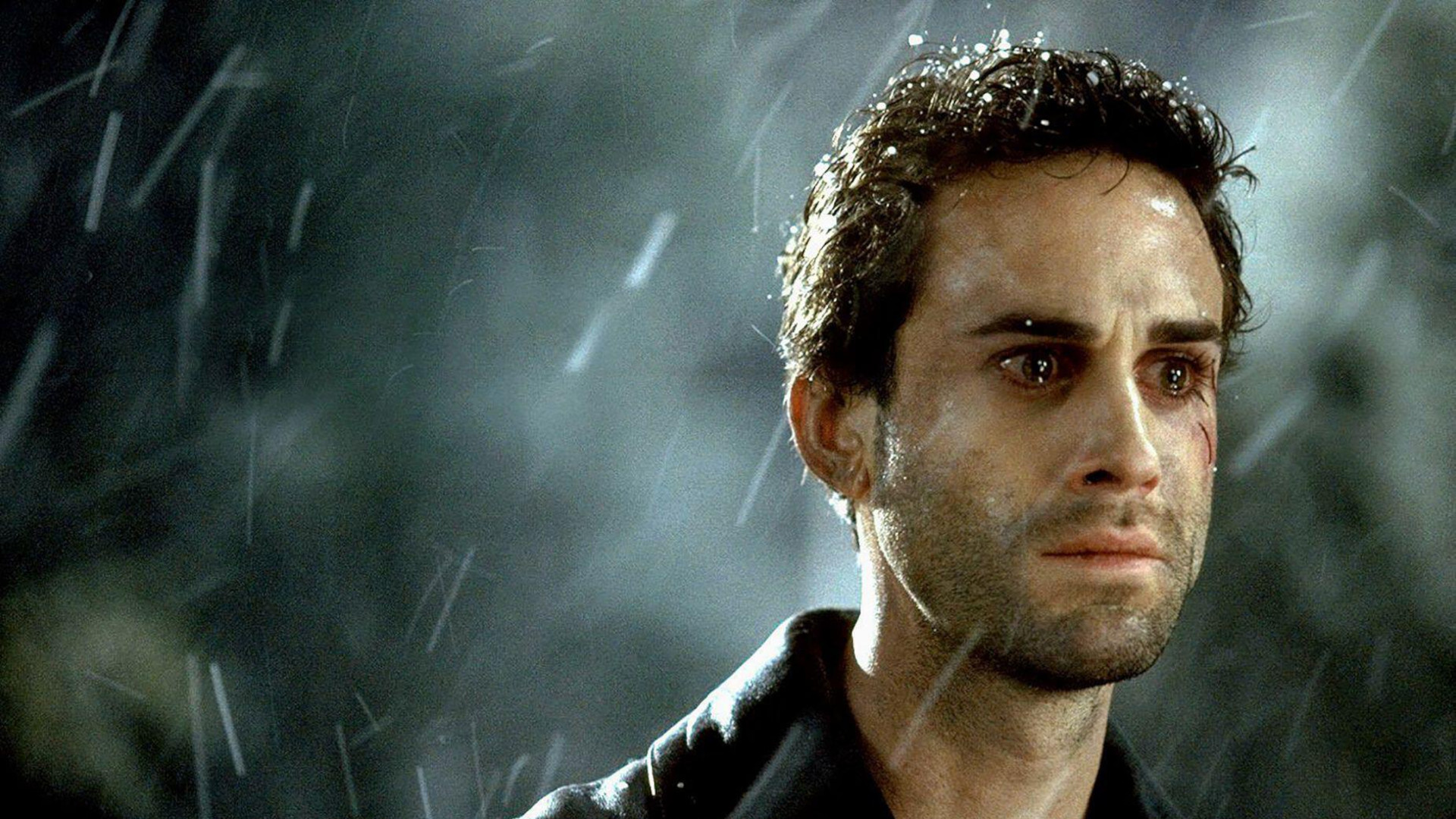 Joseph Fiennes as Adam Tallis, weeping in the rain, in Killing me Softly