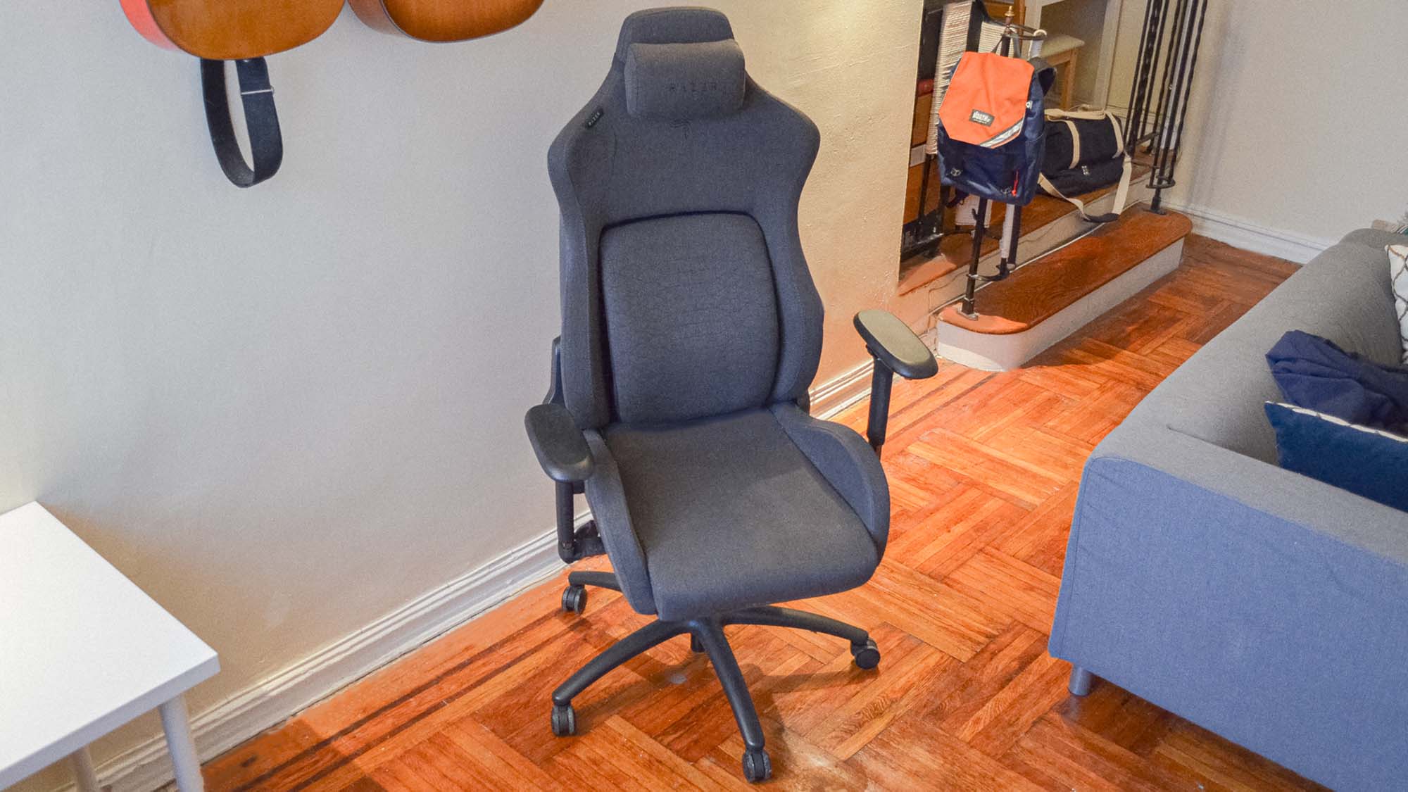 A Razer Iskur Fabric gaming chair in a living room