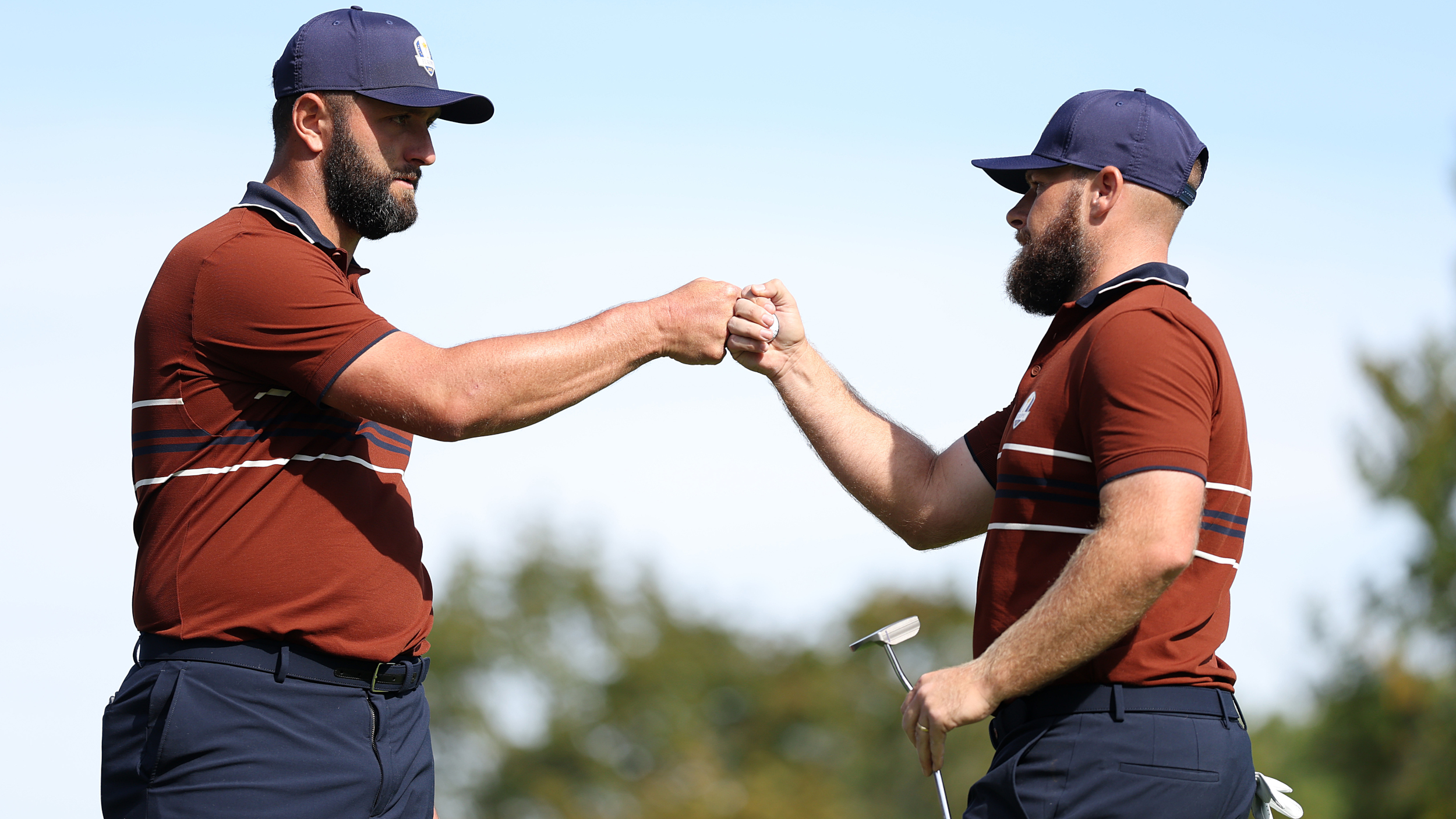 Jon Rahm and Tyrrell Hatton celebrate at the Ryder Cup 2025.
