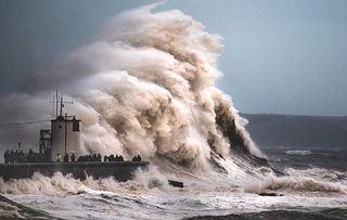 Waves batter the British coast during a storm