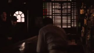 The darkened interior of the Horseshoe Bar in The Godfather II