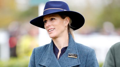 Zara Tindall's gold drop earrings seen as she attends day 2 of the November Meeting at Cheltenham Racecourse 