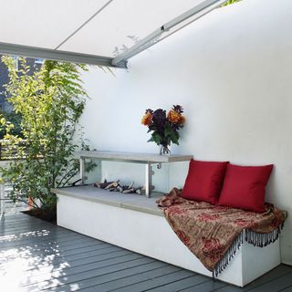 Terrace-seating area with canopy and fire