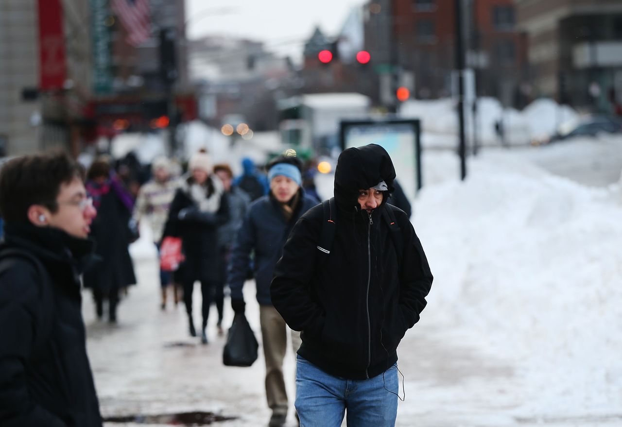 Boston commuters bundle up