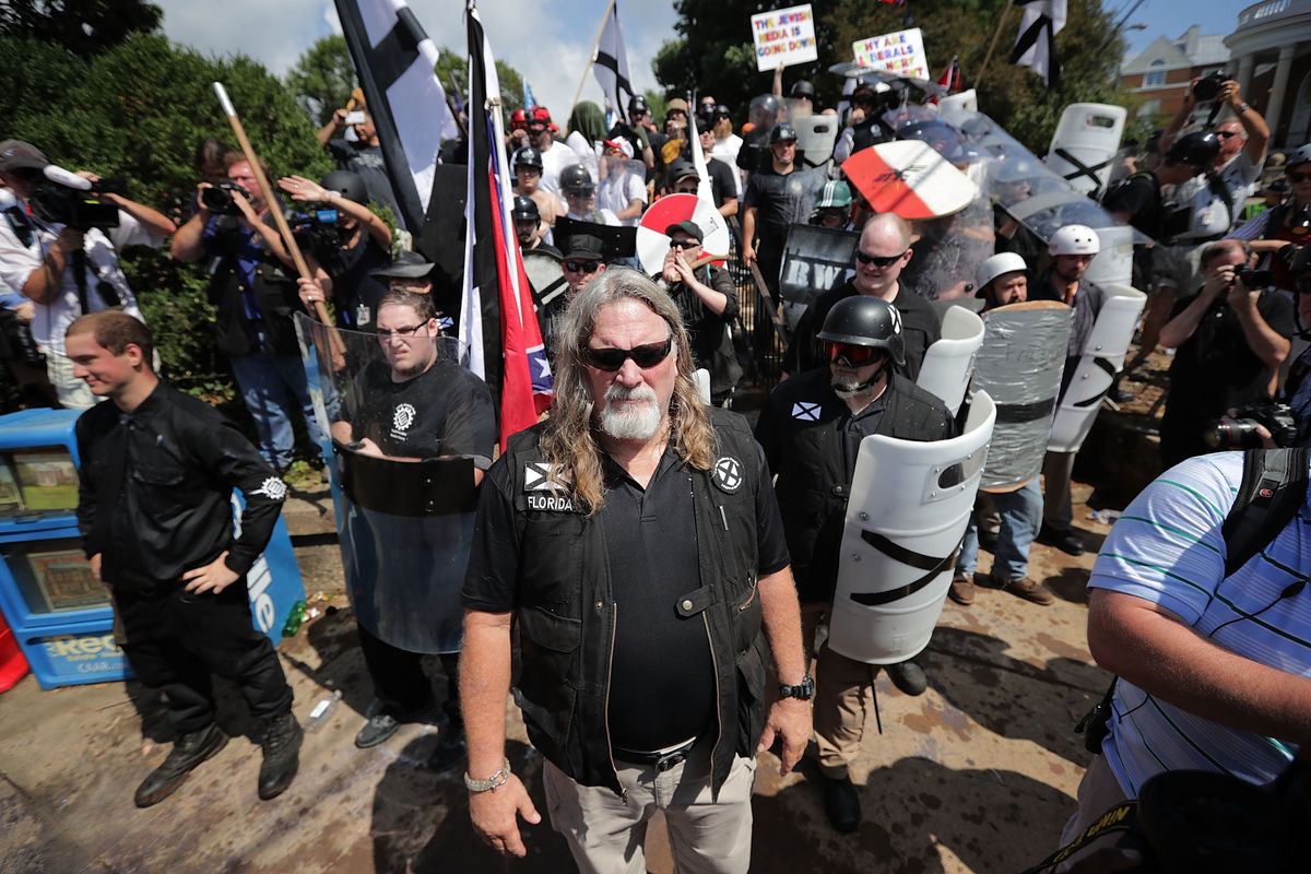 White supremacists and neo-Nazis attempt to guard the entrance to Emancipation Park during the &quot;Unite the Right&quot; rally Aug. 12, 2017, in Charlottesville, Virginia. 