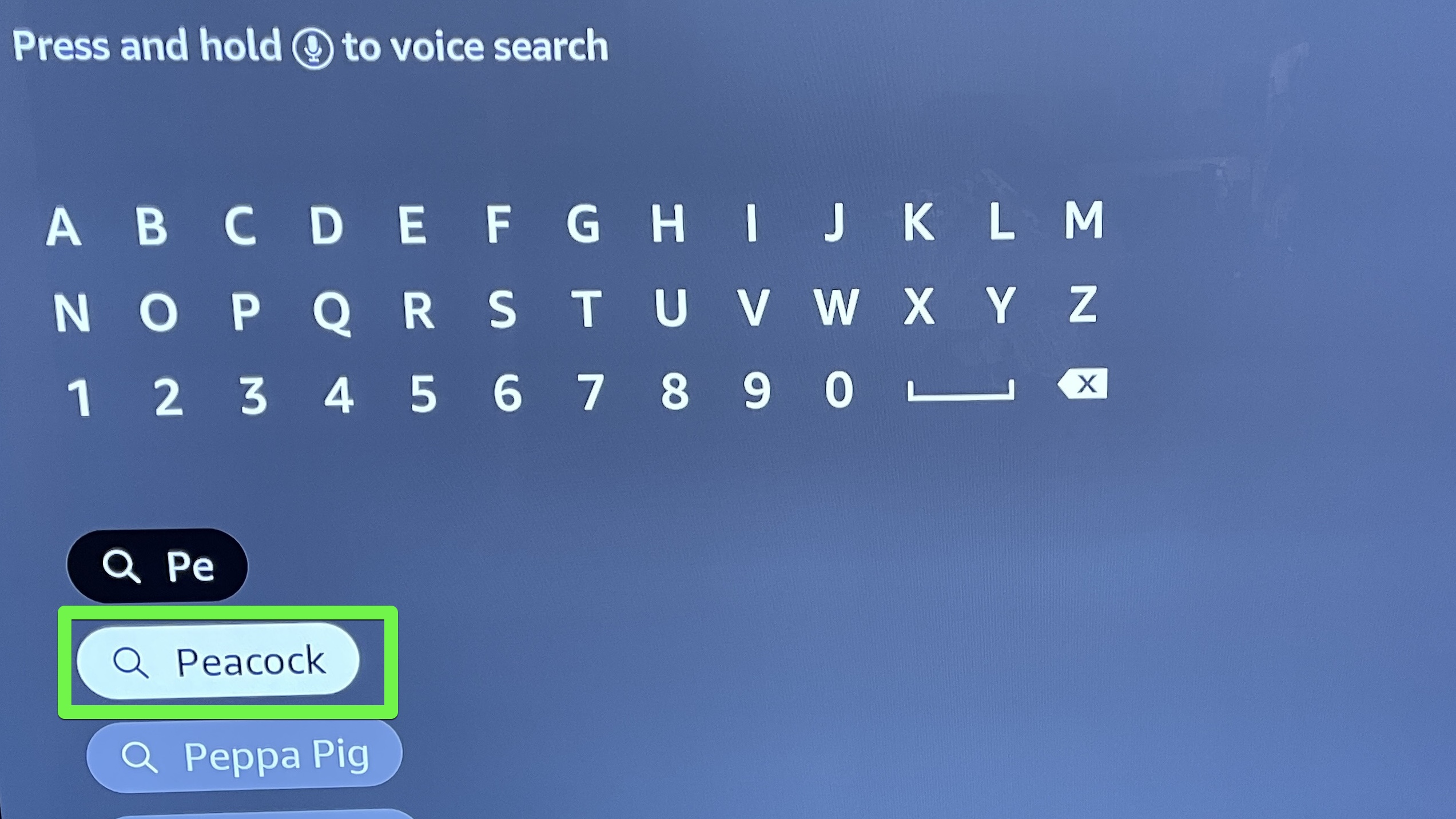 Fire TV search screen with Peacock highlighted