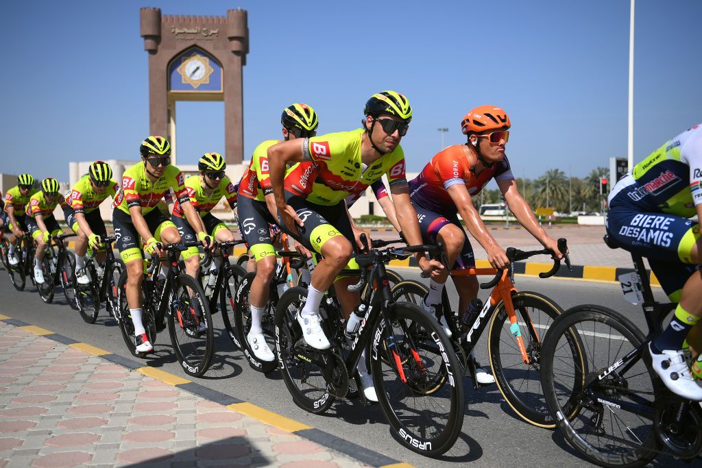 YITTI HILLS OMAN FEBRUARY 14 LR Ceriel Desal of Belgium and Team Bingoal WB and Alan Banaszek of Poland and Team Human Powered Health compete during the 12th Tour of Oman 2023 Stage 4 a 2049km stage from Izki to Yitti Hills 147m TourofOman on February 14 2023 in Yitti Hills Oman Photo by Alex BroadwayGetty Images
