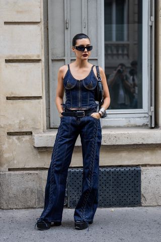 Maria Bernad wears denim top, jeans outside Burc Akyol during the Menswear Spring/Summer 2024 as part of Paris Fashion Week on June 20, 2023 in Paris, France.