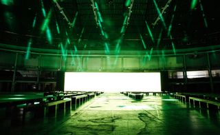 An enormous backdrop burning with bright magenta and green created a horizon-like effect for Pal Zileri’s sharp tailoring