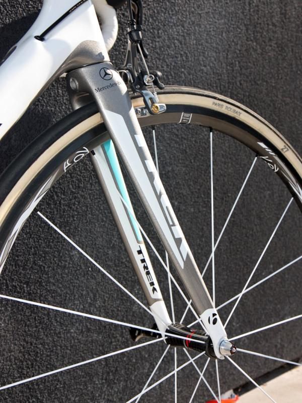 The Bontrager all-carbon forks on Leopard Trek's machines use slightly longer blades and a bit more rake to provide extra tire clearance and also even out the additional length of the modified chain stays.