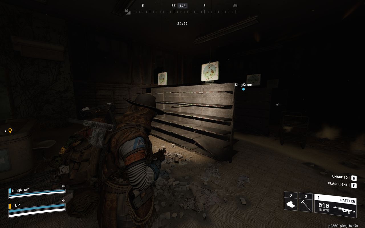 Arc Raiders cat bed location: A player looking at store shelves in a dark shop, using a flashlight.