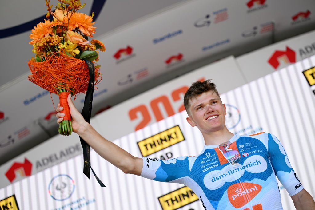 WILLUNGA AUSTRALIA JANUARY 20 Oscar Onley of United Kingdom and Team dsmfirmenich PostNL celebrates at podium as stage winner during the 24th Santos Tour Down Under 2024 Stage 5 a 1293km stage from Christies Beach to Willunga Hill 372m on January 20 2024 in Willunga Hill Australia Photo by Tim de WaeleGetty Images