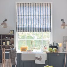 Shaker kithcen with navy and white striped blind