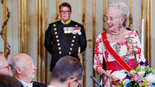 Queen Margrethe II delivers a speech next Norway's King Harald V