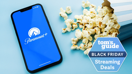 Paramount Plus app on a phone next to popcorn, with a Tom's Guide Black Friday streaming deals badge laid over it.