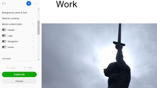 Building site in Adobe Portfolio featuring photo showing silhouette of statue