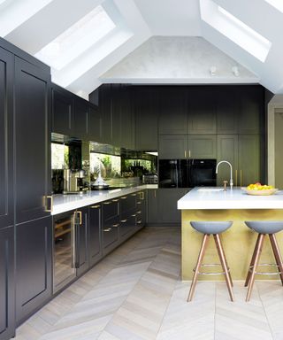 Painted kitchen with grey cabinets and yellow island
