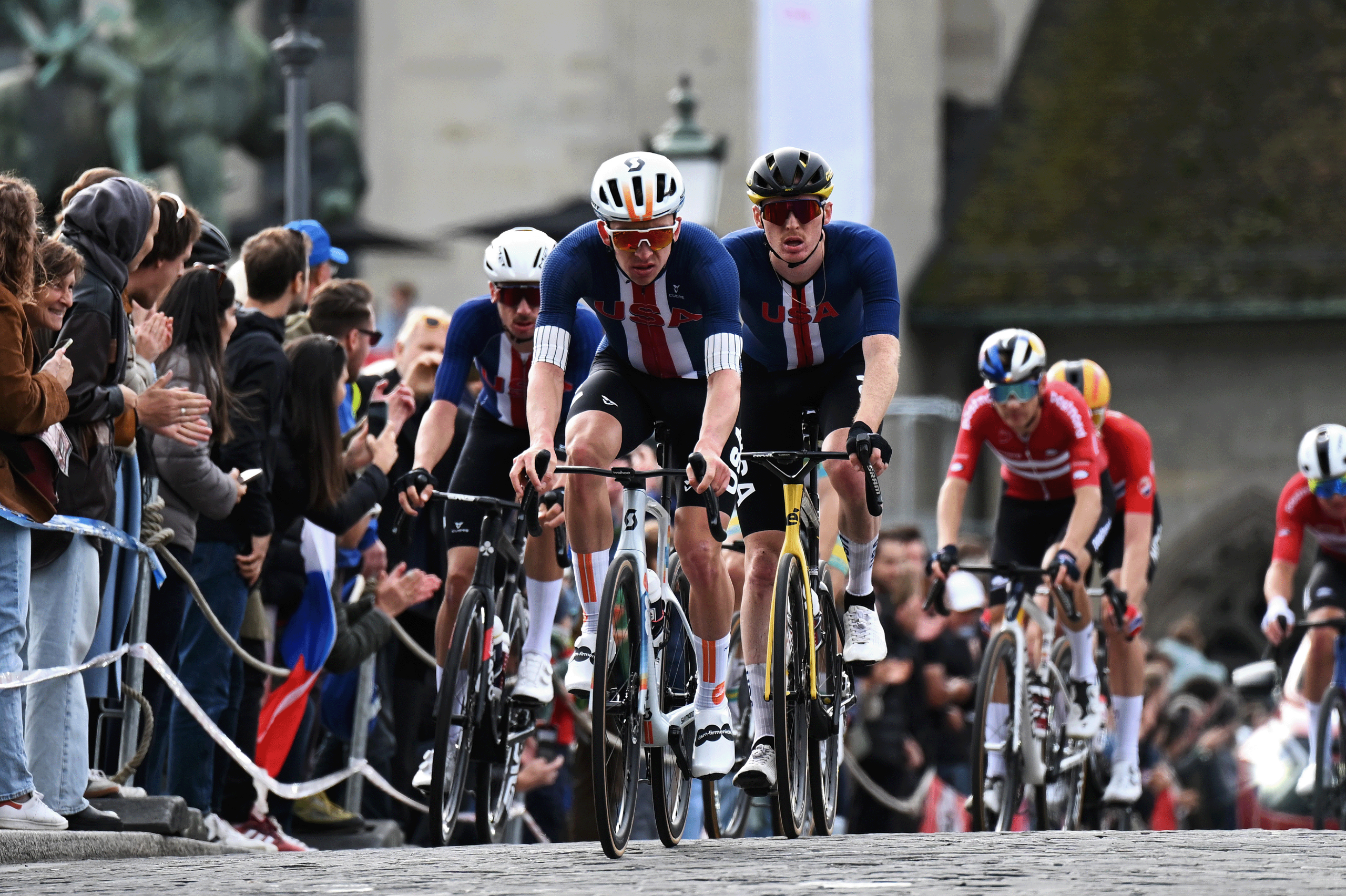 Kevin Vermaerke riding with US teammates at Zurich Worlds
